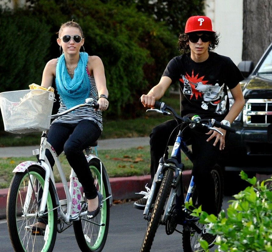 Adam Sevani and Miley Cyrus bike ride