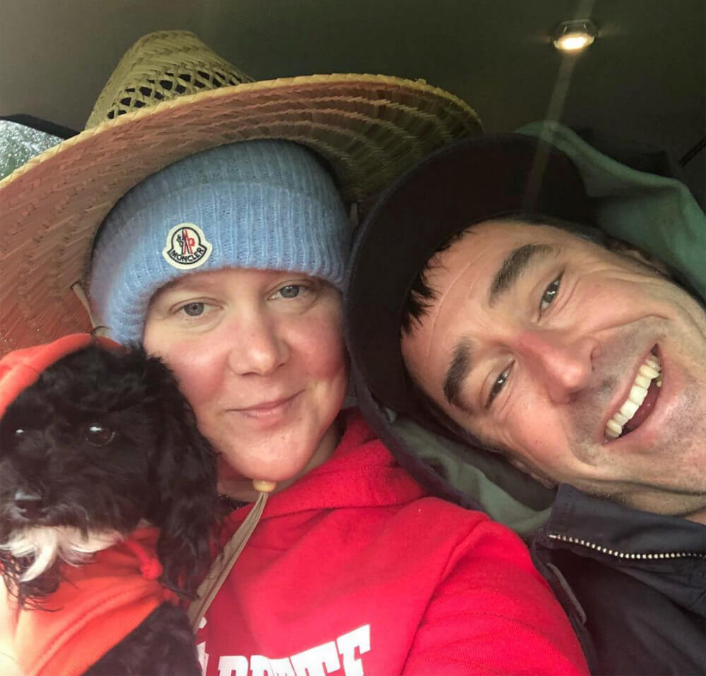 Amy cute selfie with husband and their dog