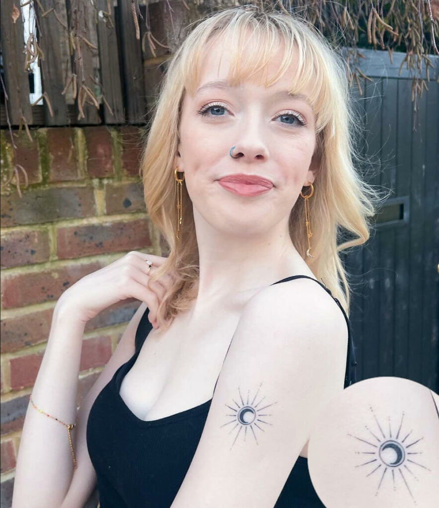 Amybeth Mcnulty celestial moon tattoo