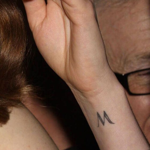 Anne Hathaway M tattoo
