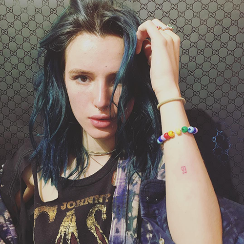 Bella Thorne arm tattoo