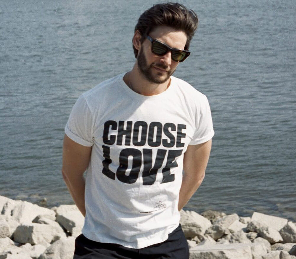 Ben Barnes with shirts (Choose Love)