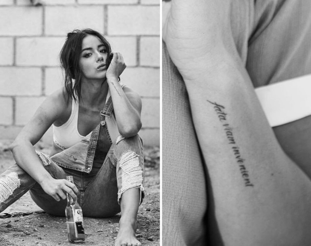 Chloe Bennet upper arm writing tattoo