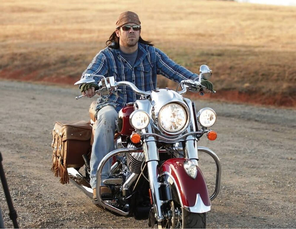 Christian Kane riding his bike