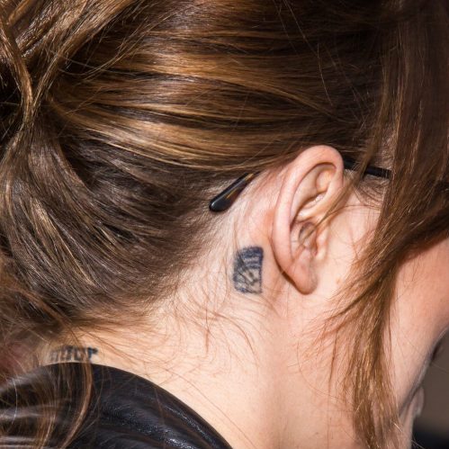 Dakota Johnson ear tattoo