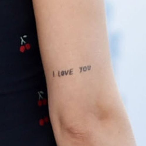Dakota Johnson i love you tattoo
