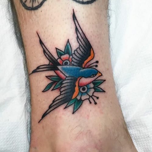 Ewan McGregor foot tattoo swallow