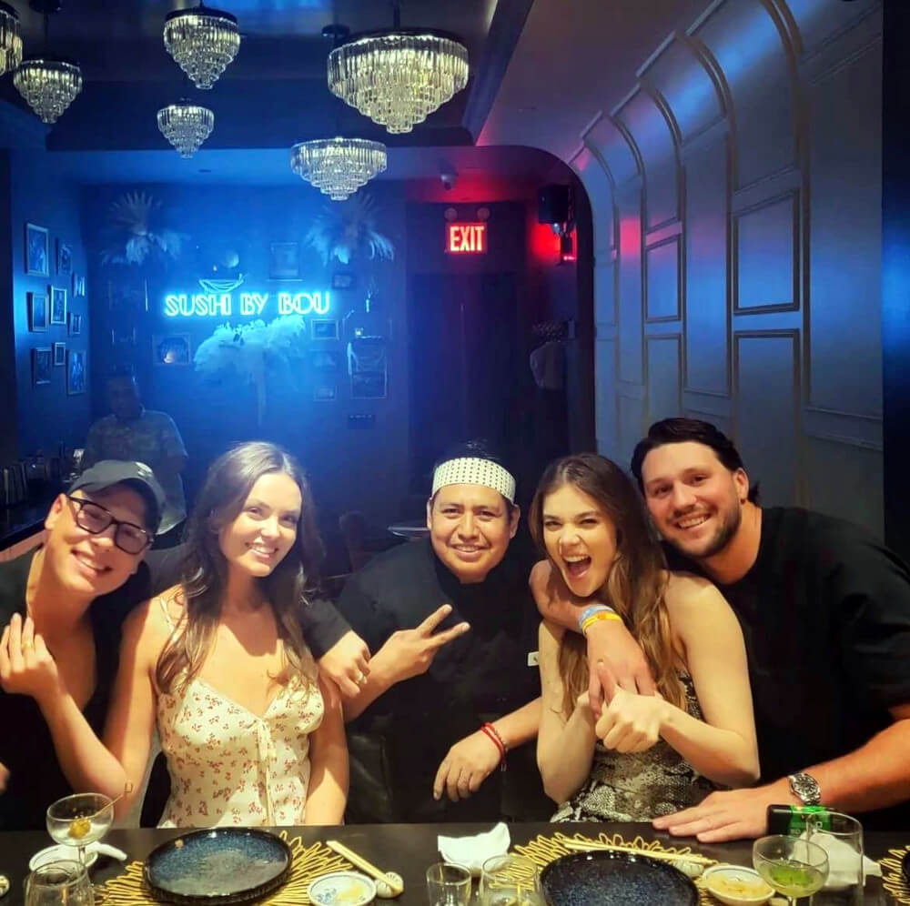 Hailee Steinfeld and Josh Allen in a group photo