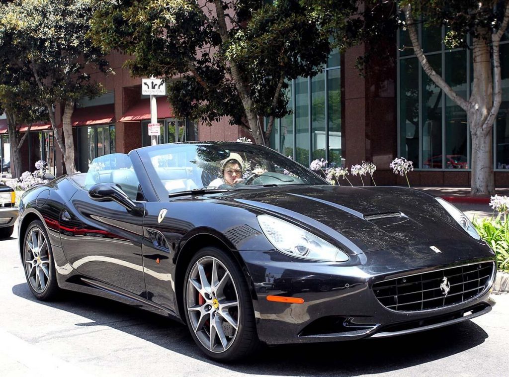 Harry Styles in Ferrari California
