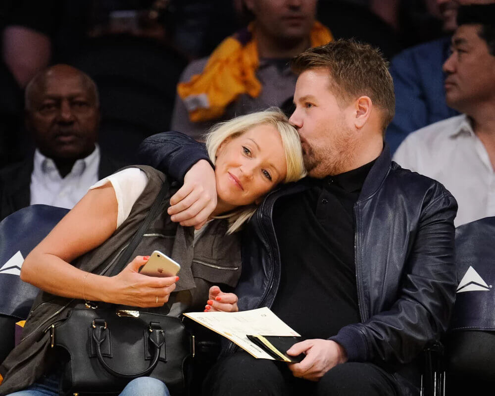 James Corden and Julia Carey at basketball game