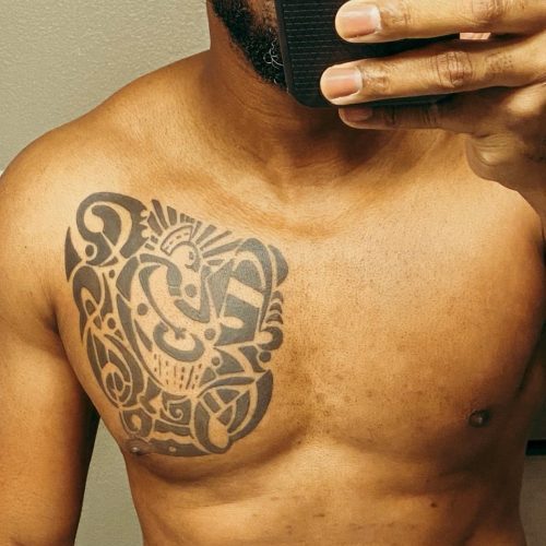 John Boyega chest tattoo