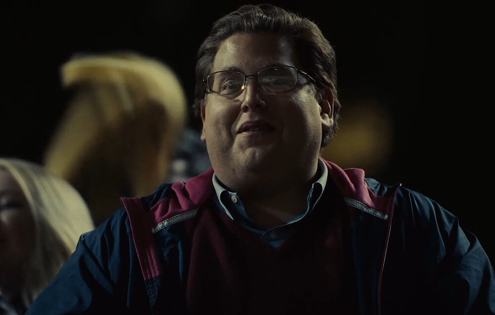 Jonah Hill in Moneyball alongside Brad Pitt