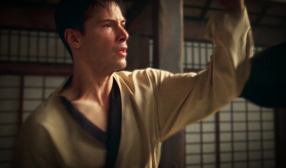 Keanu Reeves as Neo learning martial arts