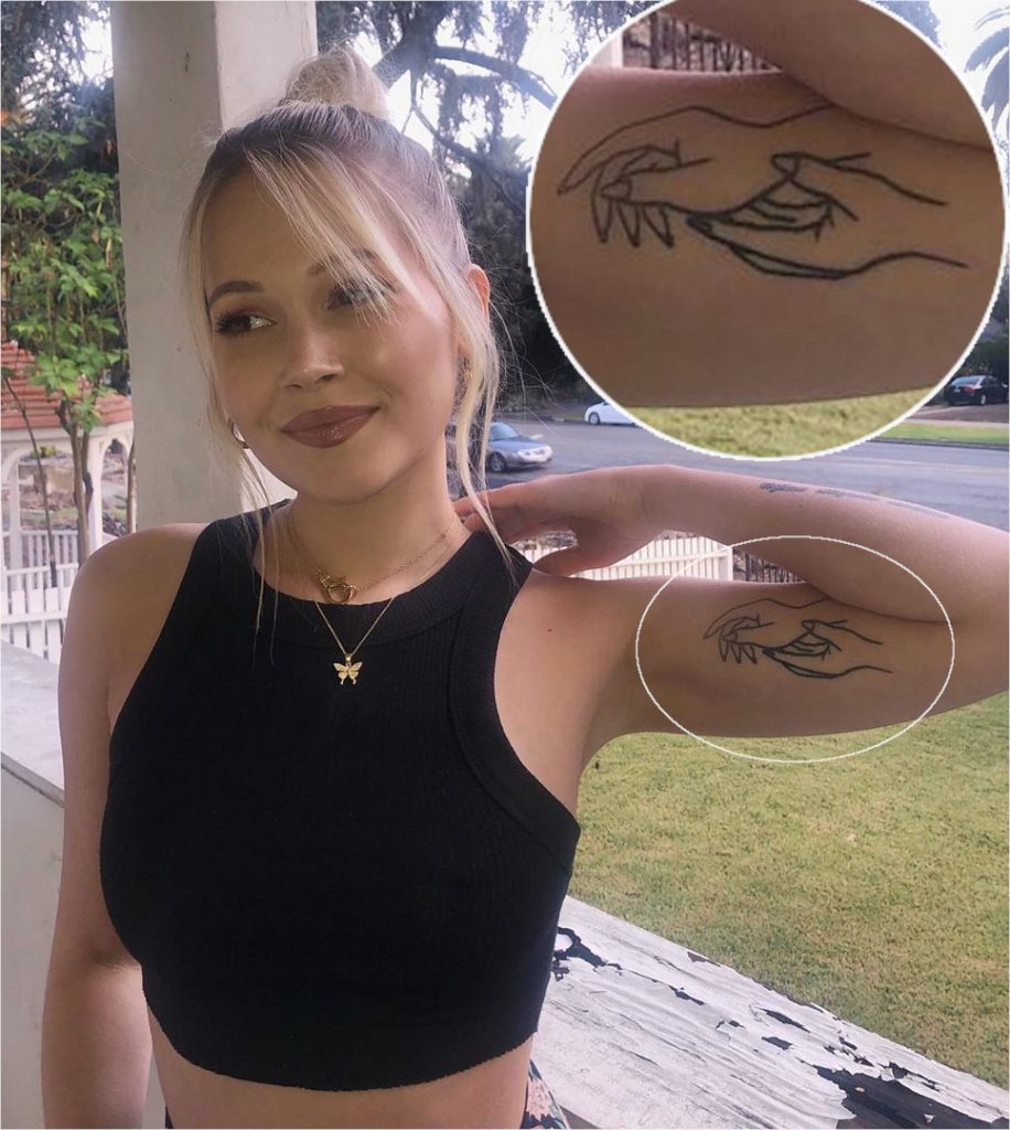 Kelli Berglund Tattoo on her inner bicep