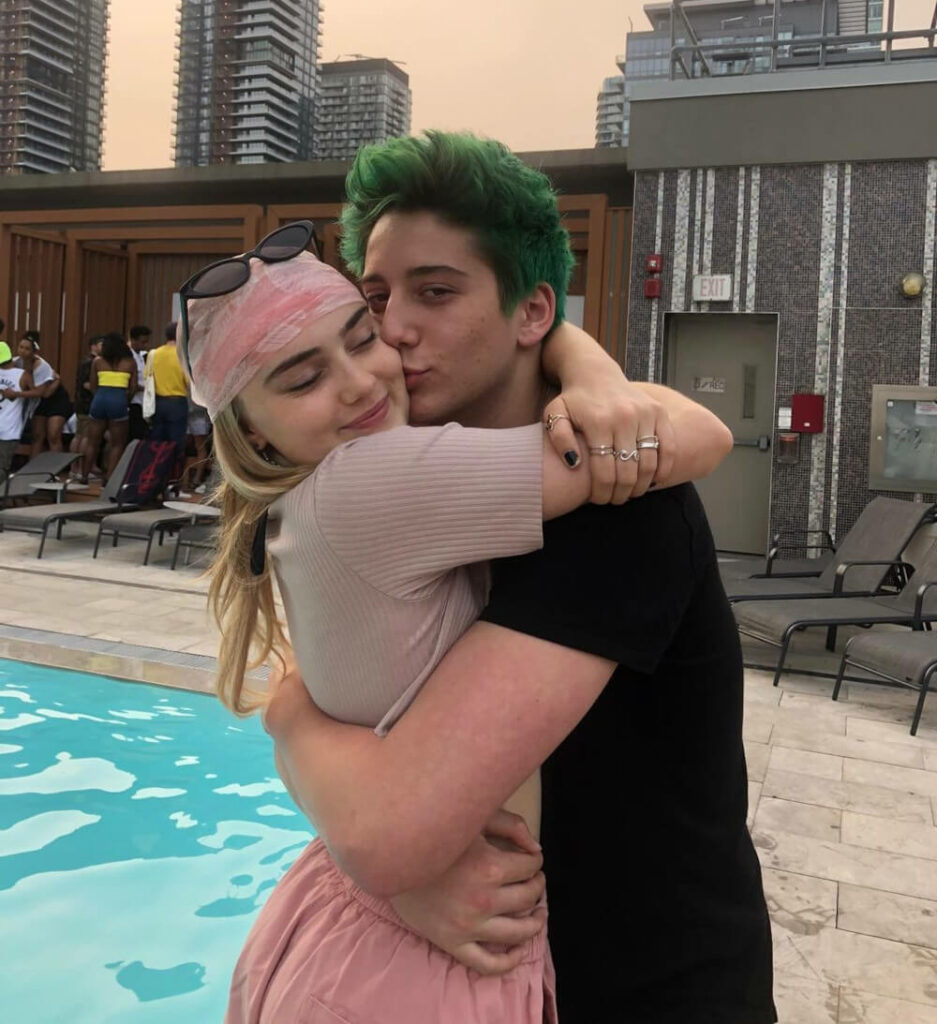 Milo Manheim and Meg Donnelly hugging