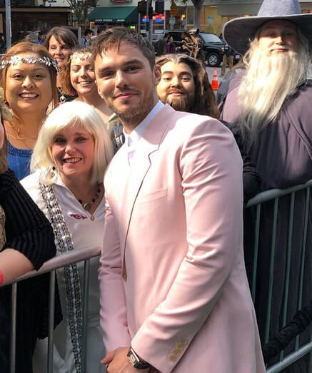 Nicholas Hoult with his fans