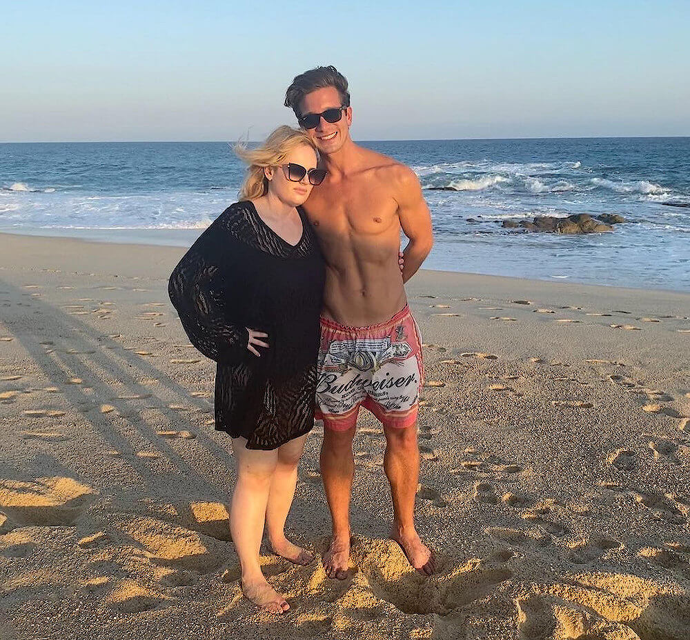 Rebel Wilson and ex boyfriend Jacob Busch at beach