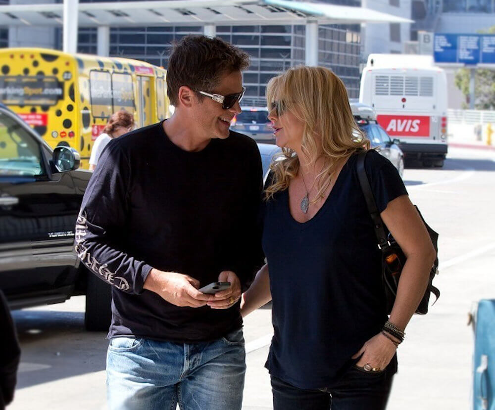Rob Lowe and Sheryl Berkoff at airport