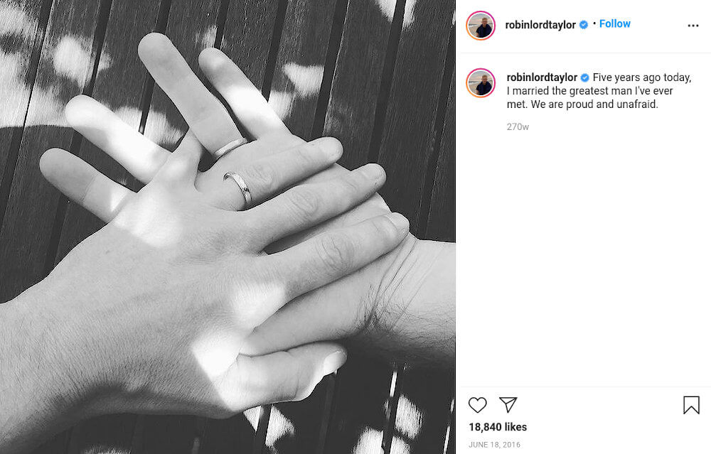 Robin Lord Taylor and husband Richard Dibella with wedding rings Instagram