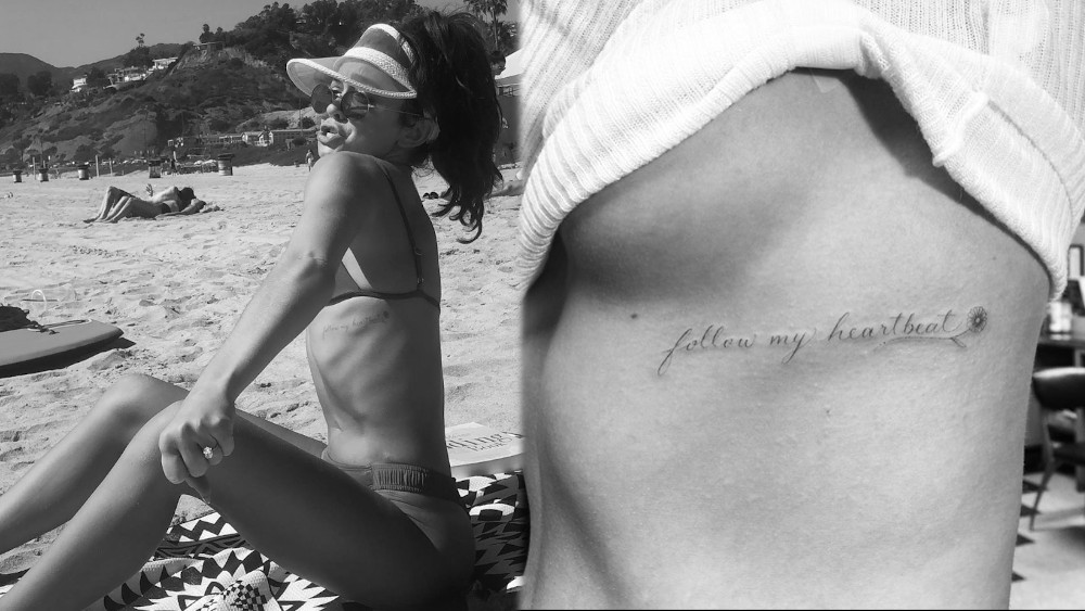 Sarah Hyland Follow My Heartbeat In Script Font On Her Left Ribcage