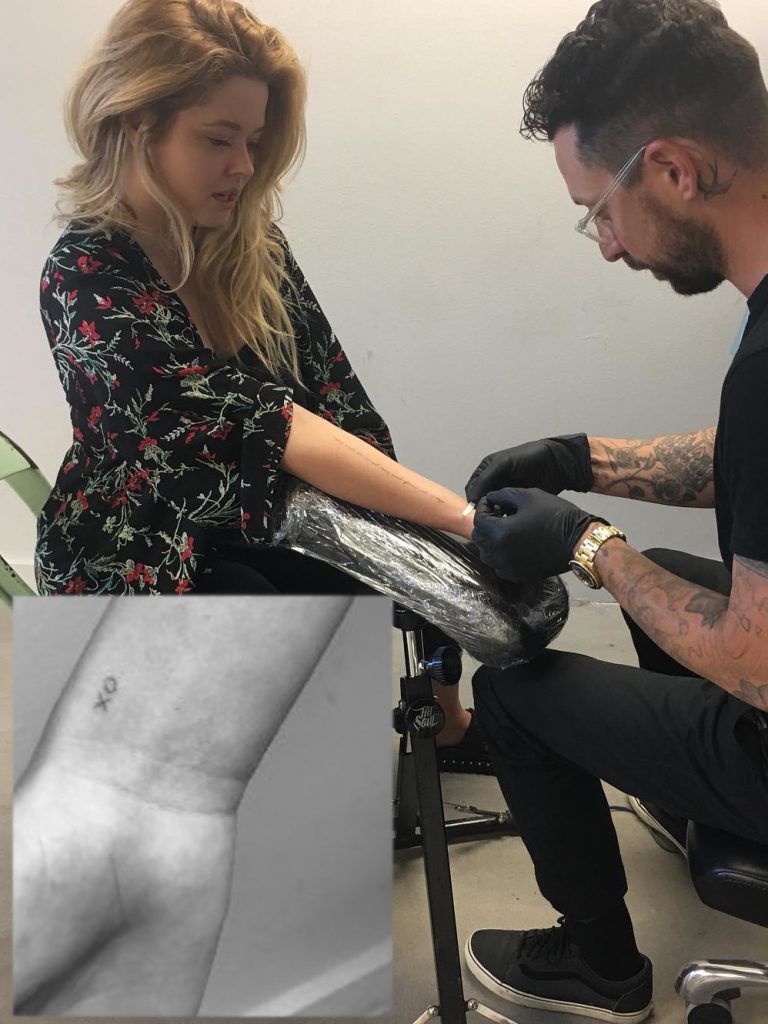 Sasha Pieterse XO Tattoo on her wrist