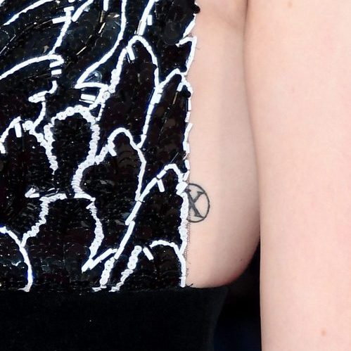 Sophie Turner x men tattoo