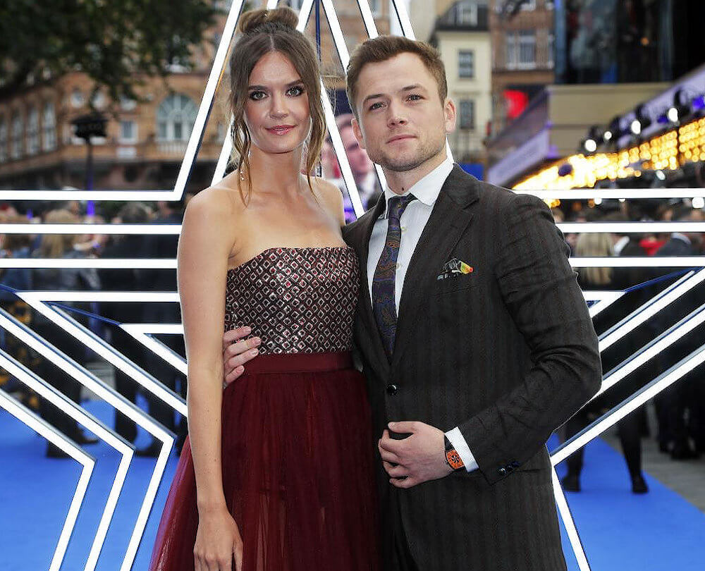 Taron Egerton with his girlfriend Emily Thomas