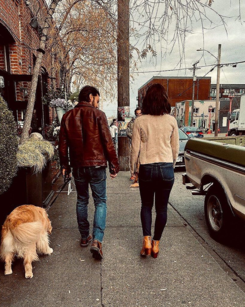 Tyler Hynes with girlfriend Erin Krakow walking with a dog