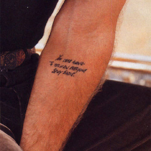 Jude Law arm tattoo